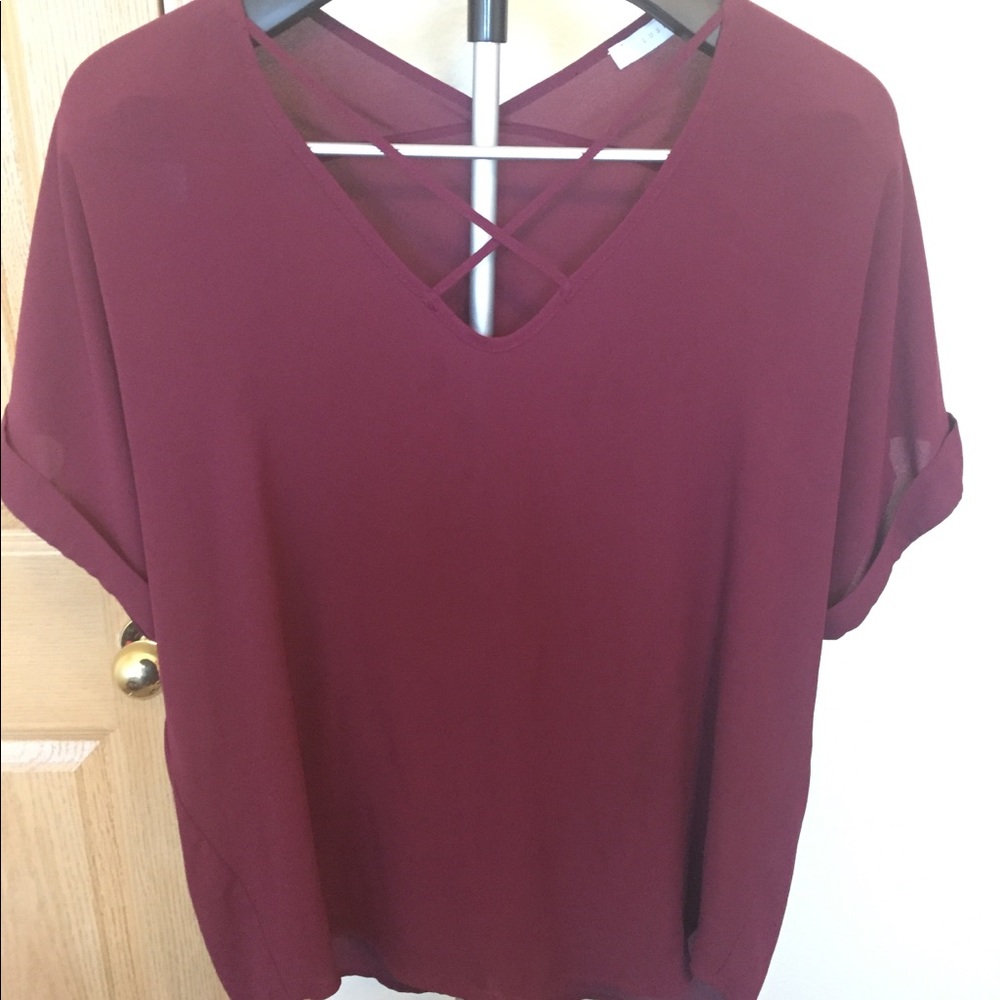 Lush criss crosses top